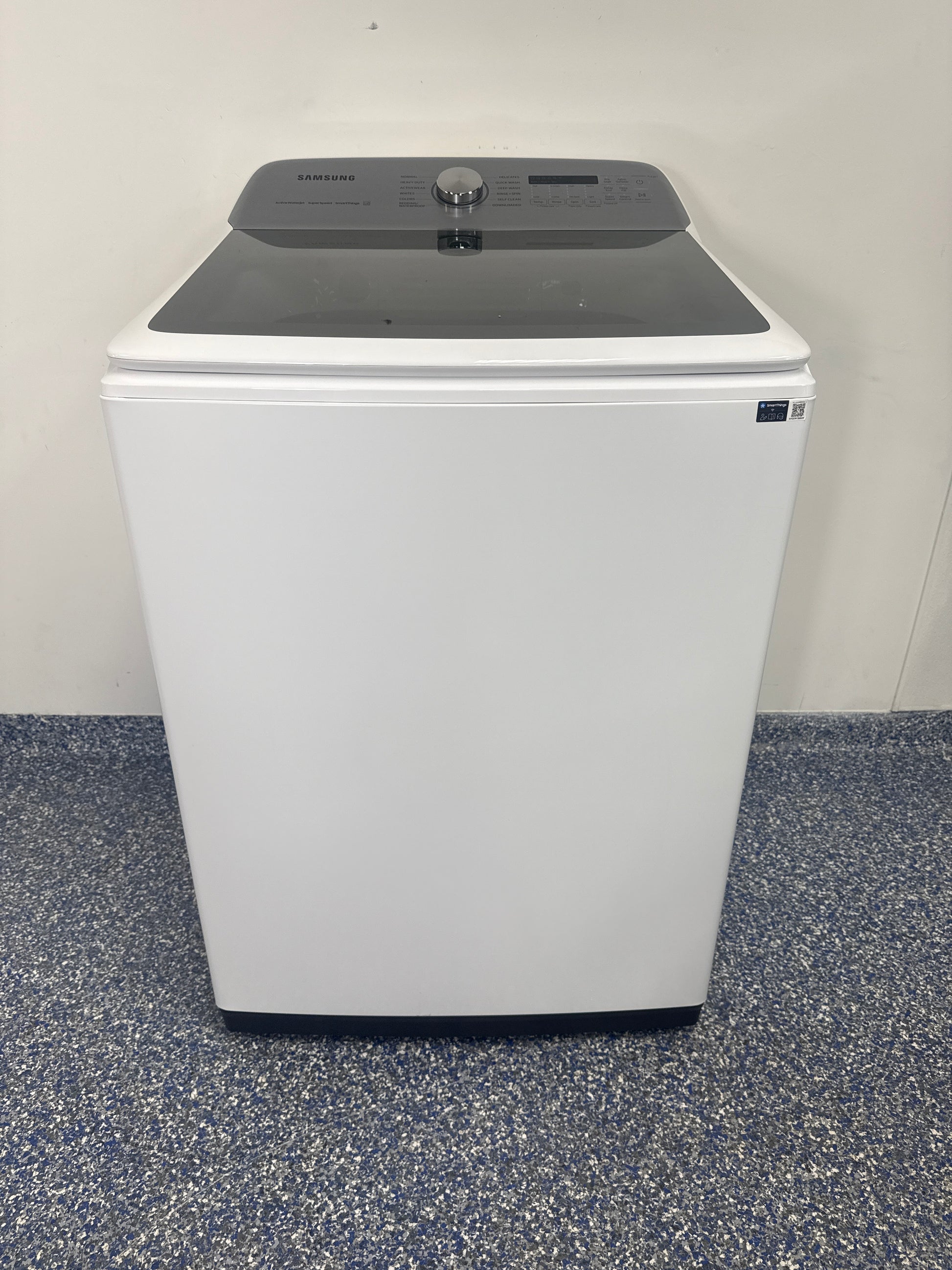 SAMSUNG WA52DG5500AW front view white smart top-load washer Kansas City laundry room