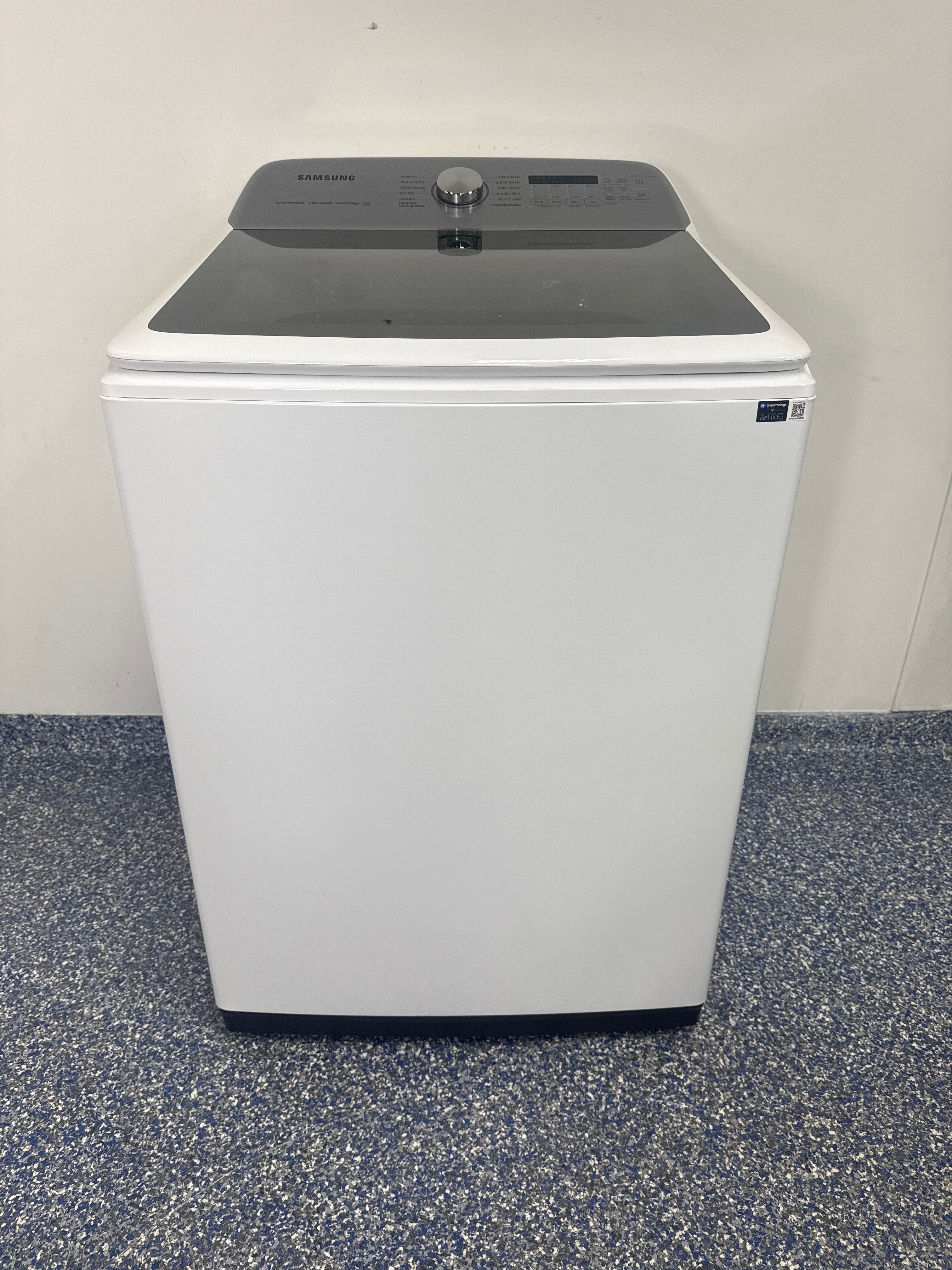 SAMSUNG WA52DG5500AW front view white smart top-load washer Kansas City laundry room