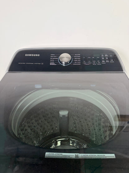 A detailed view of the digital control panel for the SAMSUNG WA54CG7150AD, showing the various wash cycles and LED display. On sale at Appliance Shark - Scratch & Dent store | Kansas City.