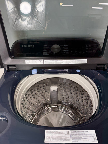 A close-up of the durable stainless steel Swirl+ tub interior of the WA54CG7150AD washer, designed for gentle yet effective cleaning. On sale at Appliance Shark - Scratch & Dent store | Kansas City.