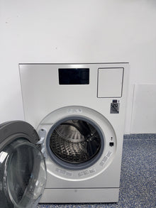 SAMSUNG WD90F53AVY 5.3 cu ft ultra-capacity washer/dryer combo Kansas City laundry room