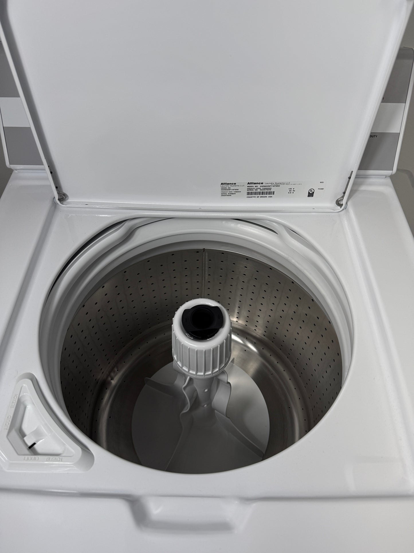 Speed Queen TC5 3.2 cu ft white top load washer (TC5003WN) with lid open drum interior with agitator