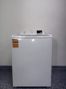 The interior of the WHIRLPOOL WTW4307SW washer, showing the stainless steel wash basket, an ideal appliance for homes in Overland Park, KS.