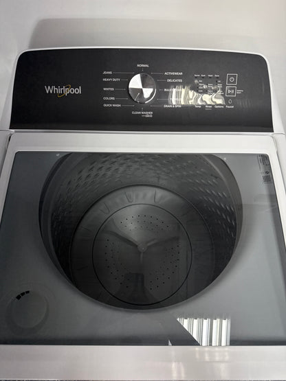 The interior of the WHIRLPOOL WTW5020SW washer, showing the Smooth Impeller and Auto Sensing technology, an ideal appliance for homes in Overland Park.