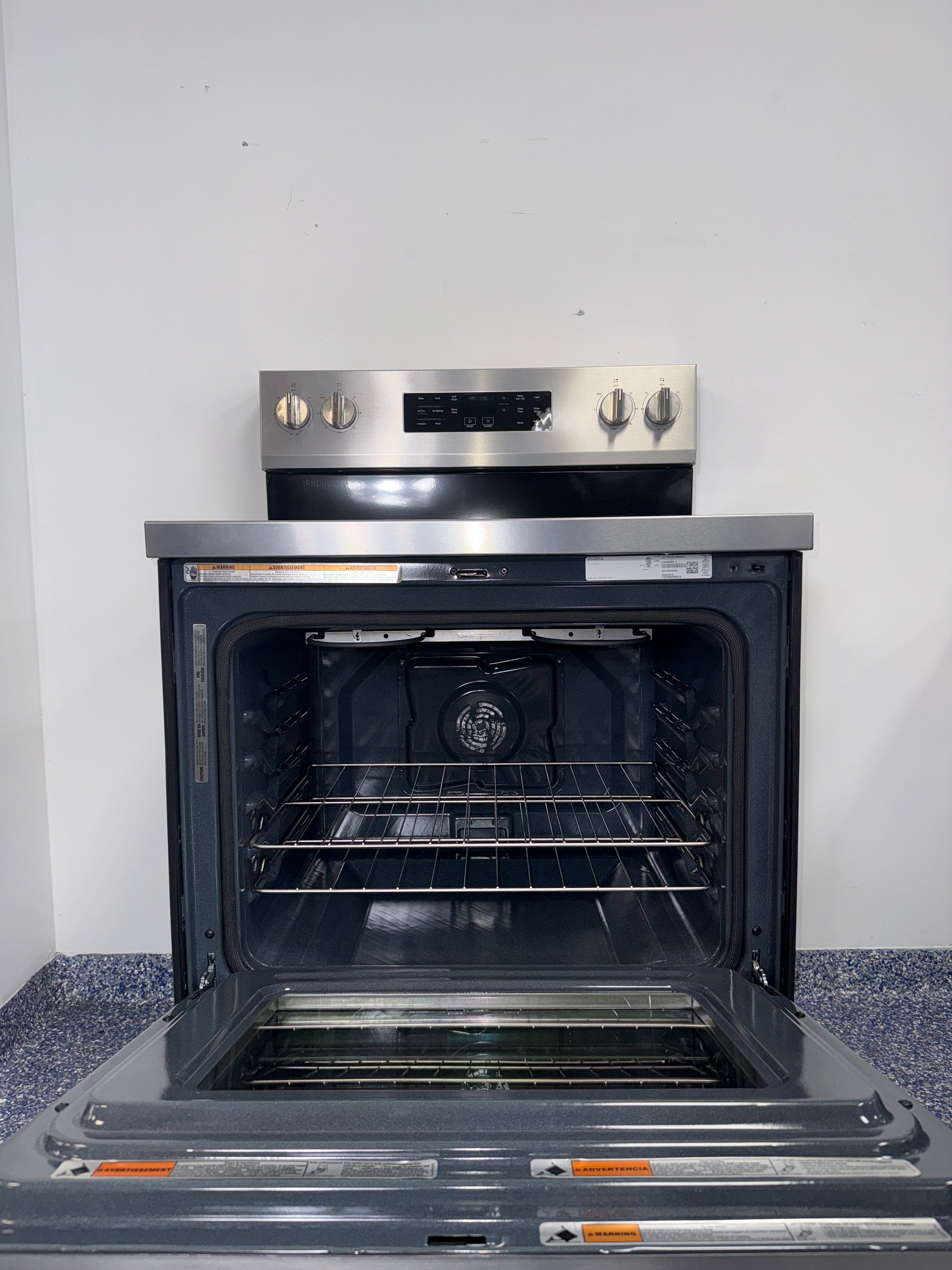The WHIRLPOOL 5.3 cu. ft. electric range, model WFES5030RZ, available at Appliance Shark.