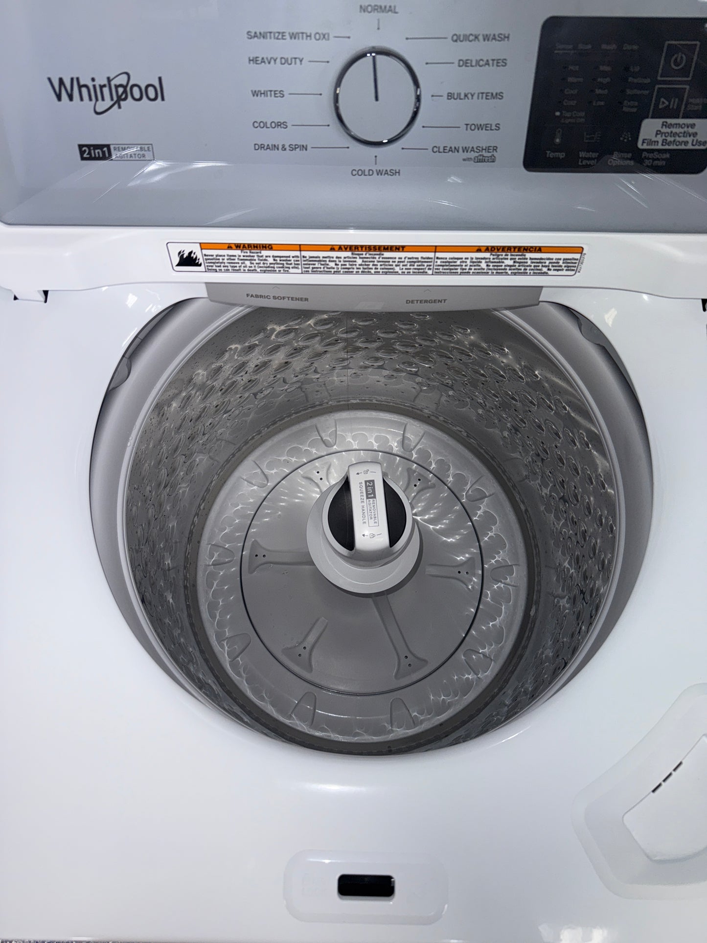 The WHIRLPOOL 3.8 cu. ft. top load washer, model WTW4307SW, featuring a High-Efficiency Design, available at Appliance Shark.