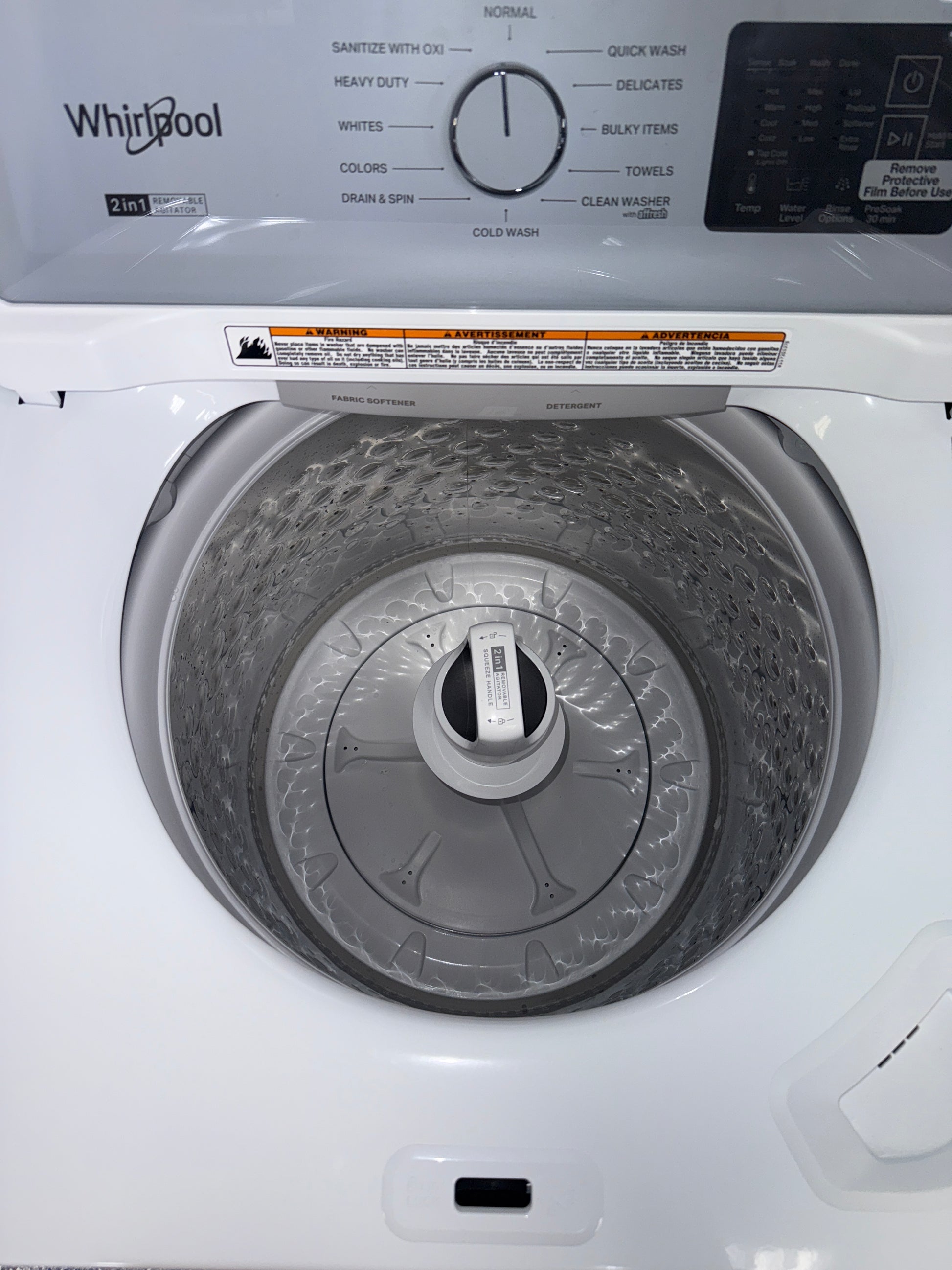 The WHIRLPOOL 3.8 cu. ft. top load washer, model WTW4307SW, featuring a High-Efficiency Design, available at Appliance Shark.
