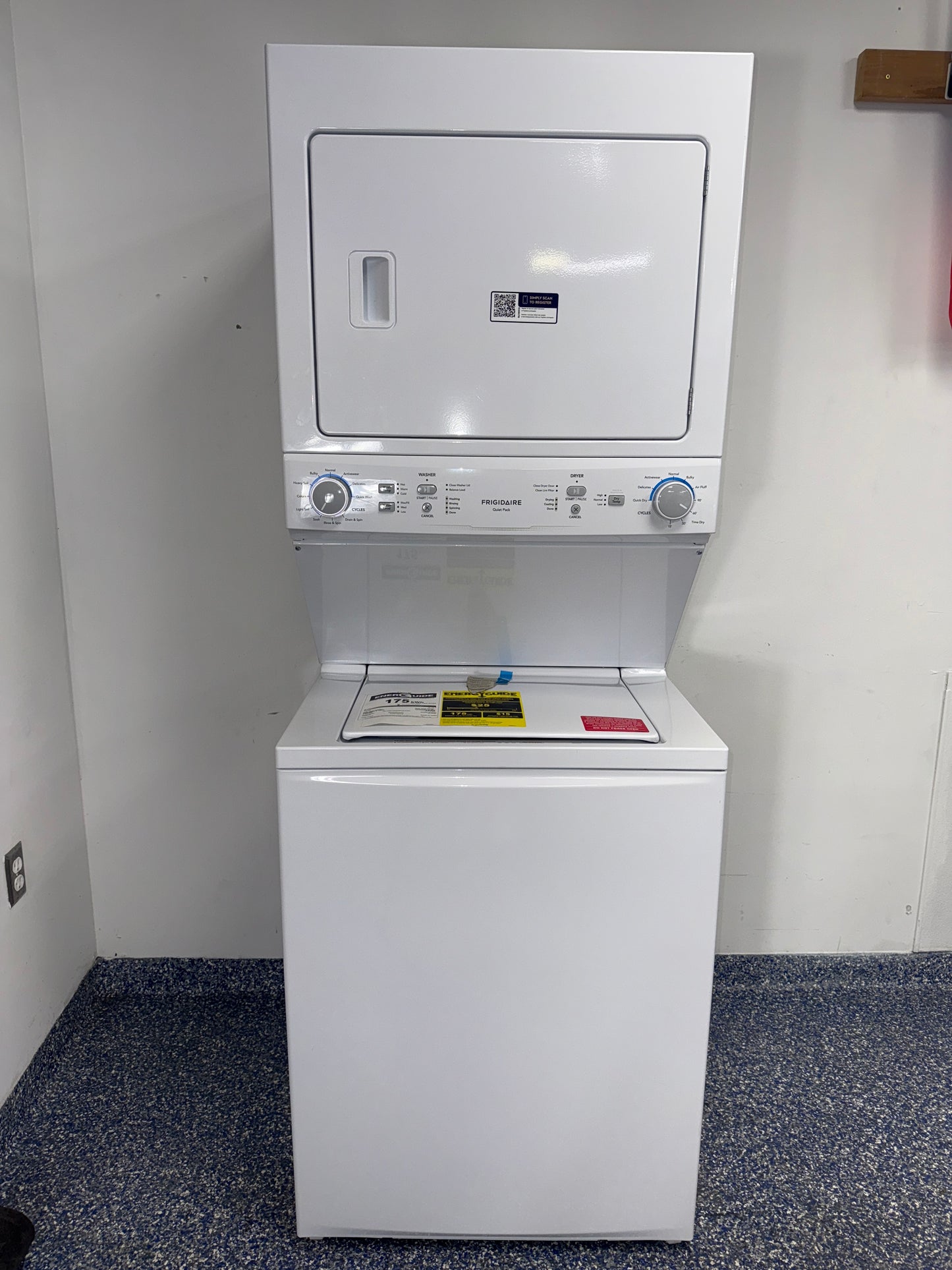 Front view of the WHIRLPOOL WET4024HW0 front load washer in a Kansas City laundry room.