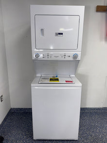 Front view of the WHIRLPOOL WET4024HW0 front load washer in a Kansas City laundry room.