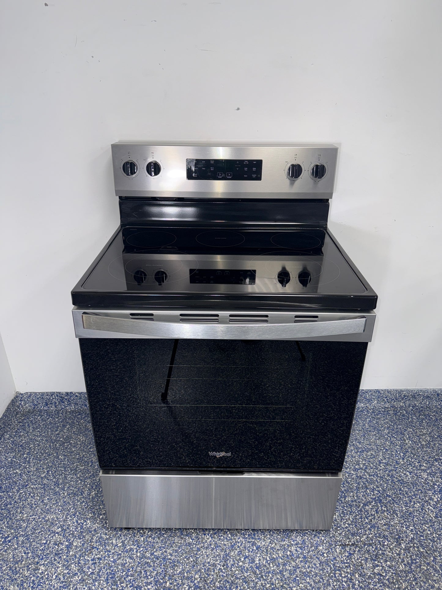 Front view of the WHIRLPOOL WFES3330RZ2 electric range in Overland Park, KS.