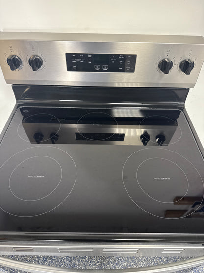 Oven interior of the WHIRLPOOL WFES3330RZ2 electric range near Overland Park, KS.