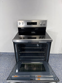 Control panel and cooking modes on the WHIRLPOOL WFES5030RZ electric range in the Kansas City Metro area.