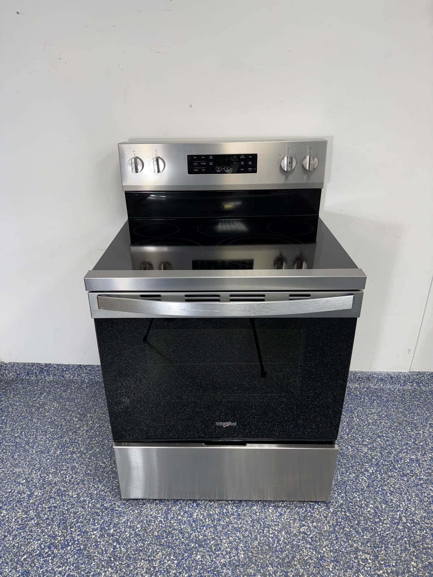 Front view of the WHIRLPOOL WFES5030RZ electric range available in Overland Park near Kansas City.