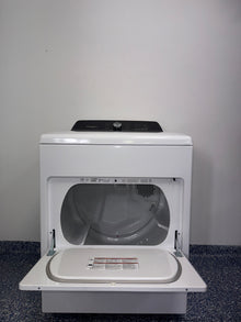 The interior of the WHIRLPOOL WGD5010LW dryer, showcasing its spacious 7.0 cu. ft. capacity, for sale in Kansas.