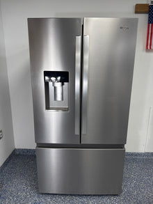Front view of the WHIRLPOOL WRFC5236RZ00 French door refrigerator in Overland Park, KS.