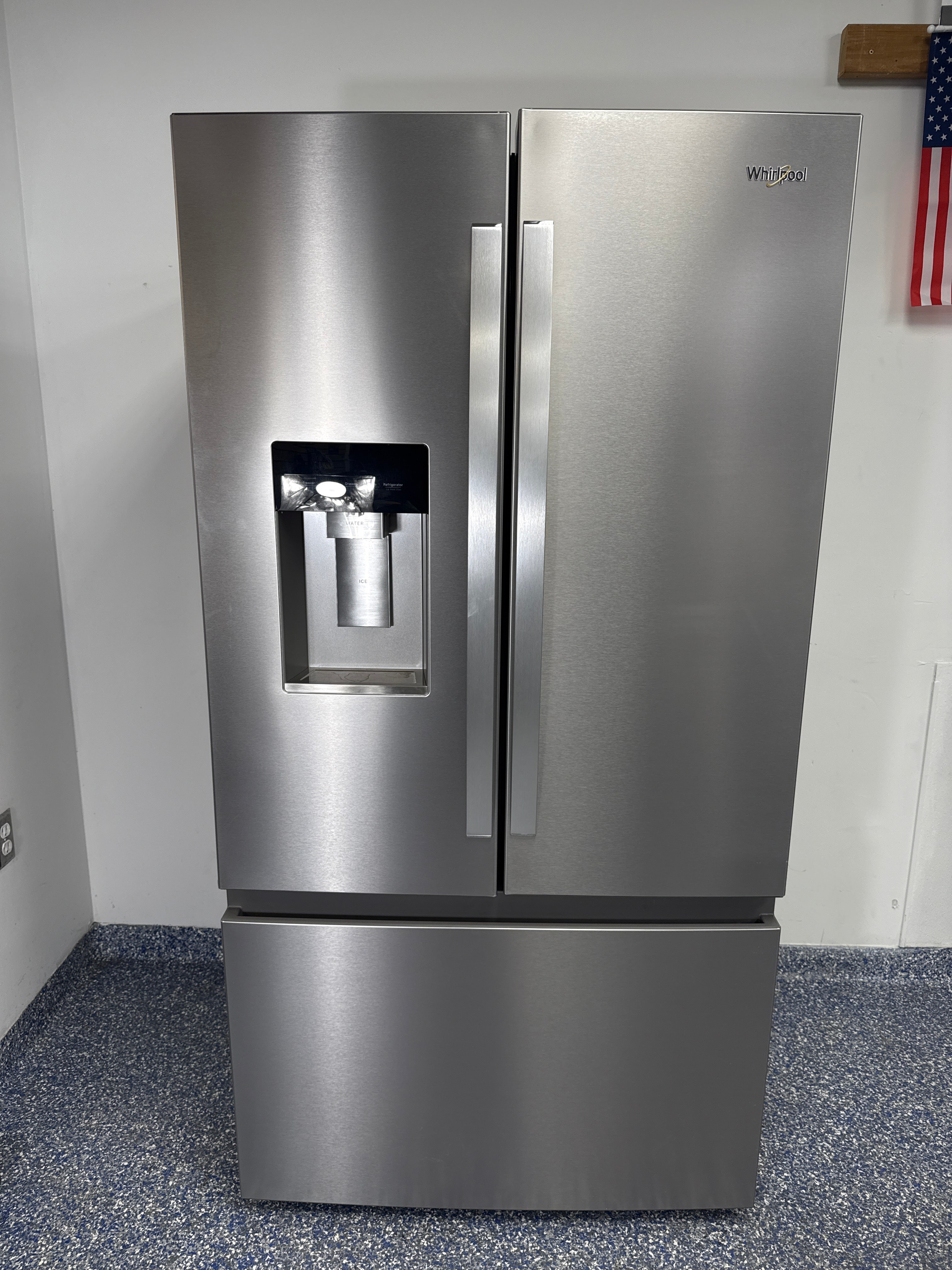 Front view of the WHIRLPOOL WRFC5236RZ00 French door refrigerator in Overland Park, KS.
