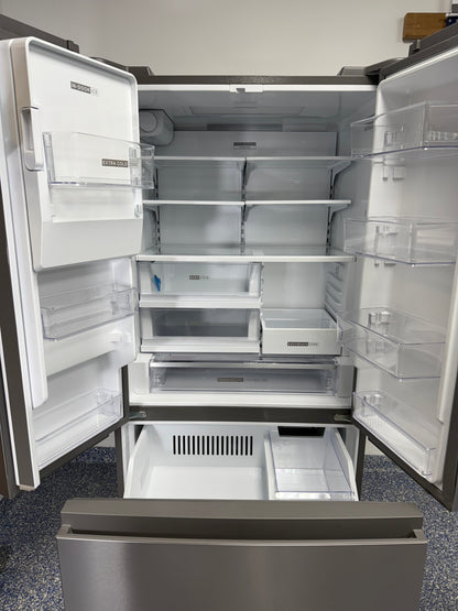 Through-the-door ice and water dispenser on the WHIRLPOOL WRFC5236RZ00 refrigerator near Kansas City.