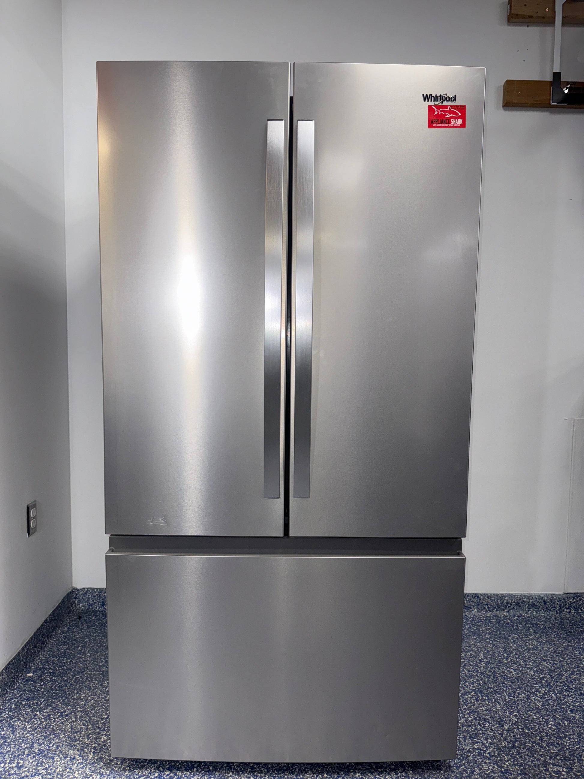 A front view of the WHIRLPOOL WRFF3136SZ refrigerator, highlighting its In-Door-Ice System and a great deal in Kansas.