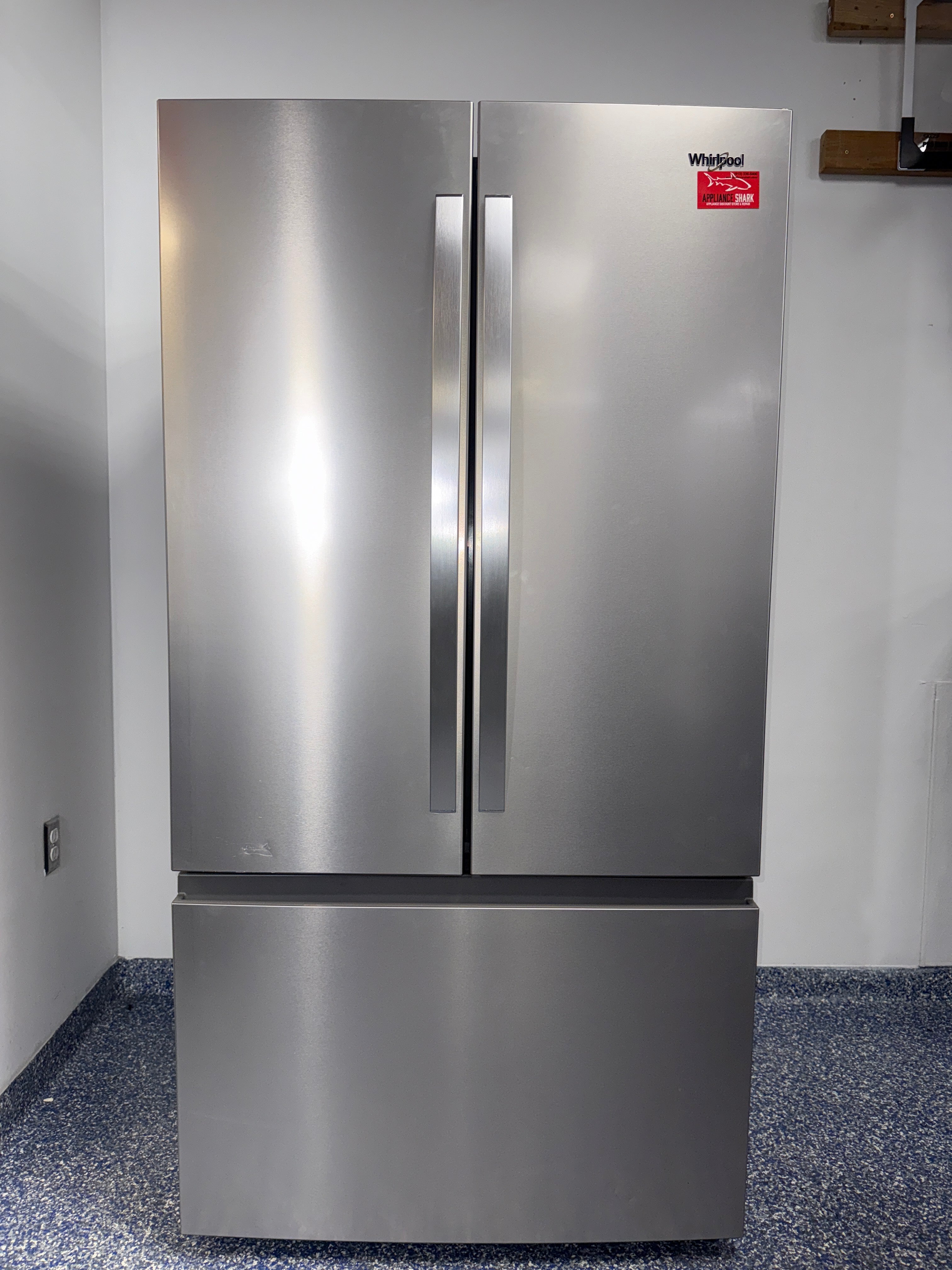 A front view of the WHIRLPOOL WRFF3136SZ refrigerator, highlighting its In-Door-Ice System and a great deal in Kansas.