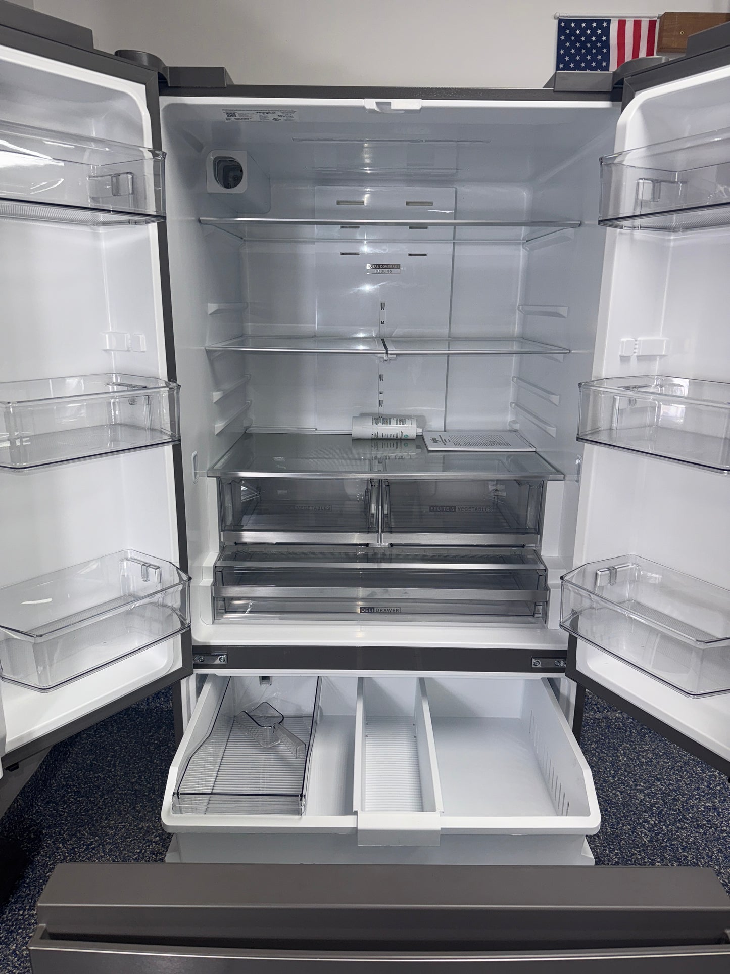 Interior shot highlighting humidity-controlled crispers and glass shelves of the WHIRLPOOL WRFF3136SZ, for Kansas City homes.