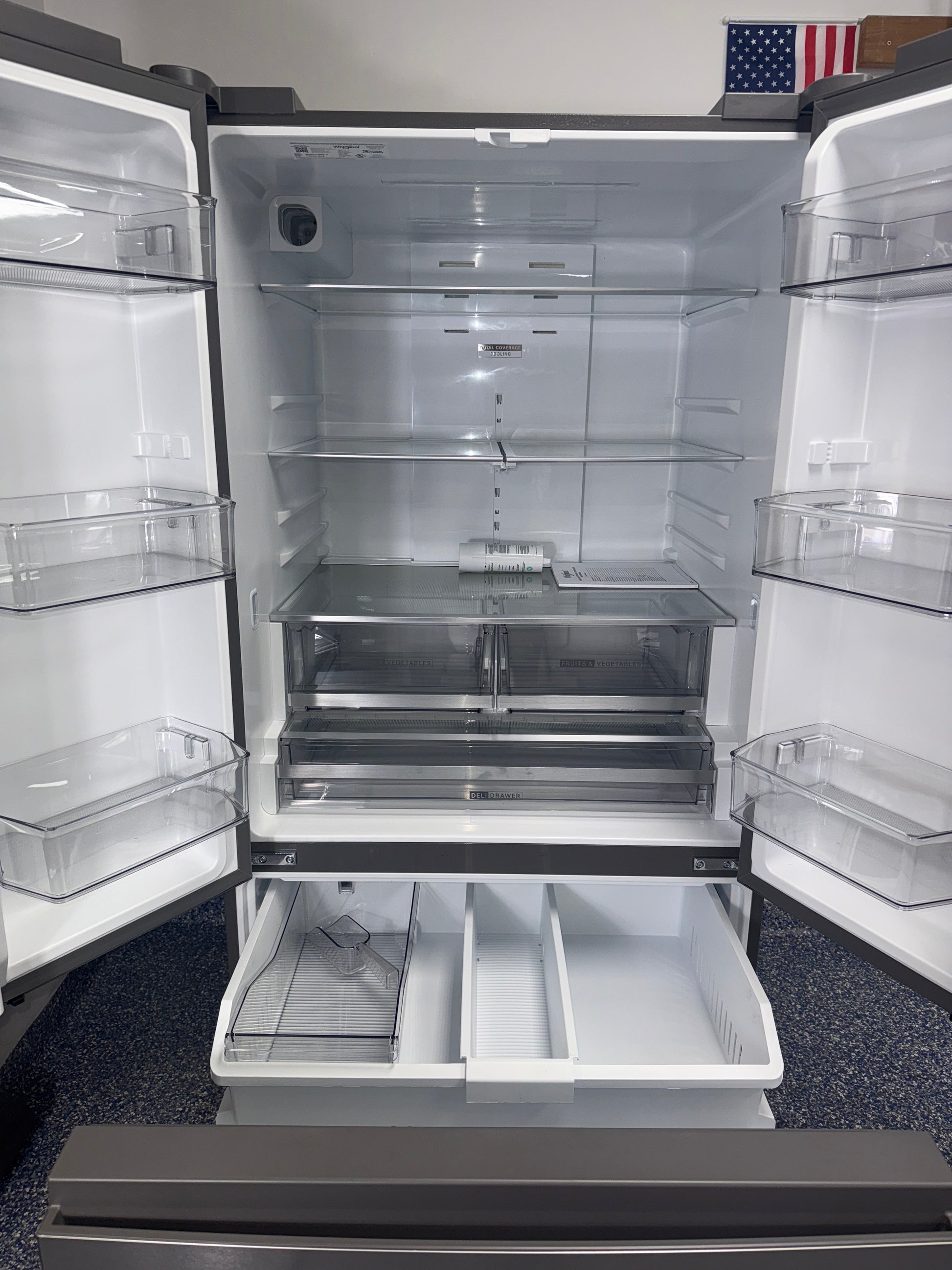 Interior shot highlighting humidity-controlled crispers and glass shelves of the WHIRLPOOL WRFF3136SZ, for Kansas City homes.