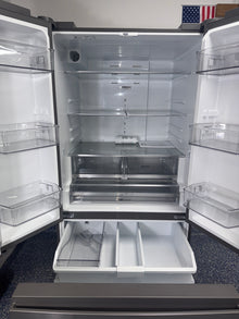 Interior shot highlighting humidity-controlled crispers and glass shelves of the WHIRLPOOL WRFF3136SZ, for Kansas City homes.