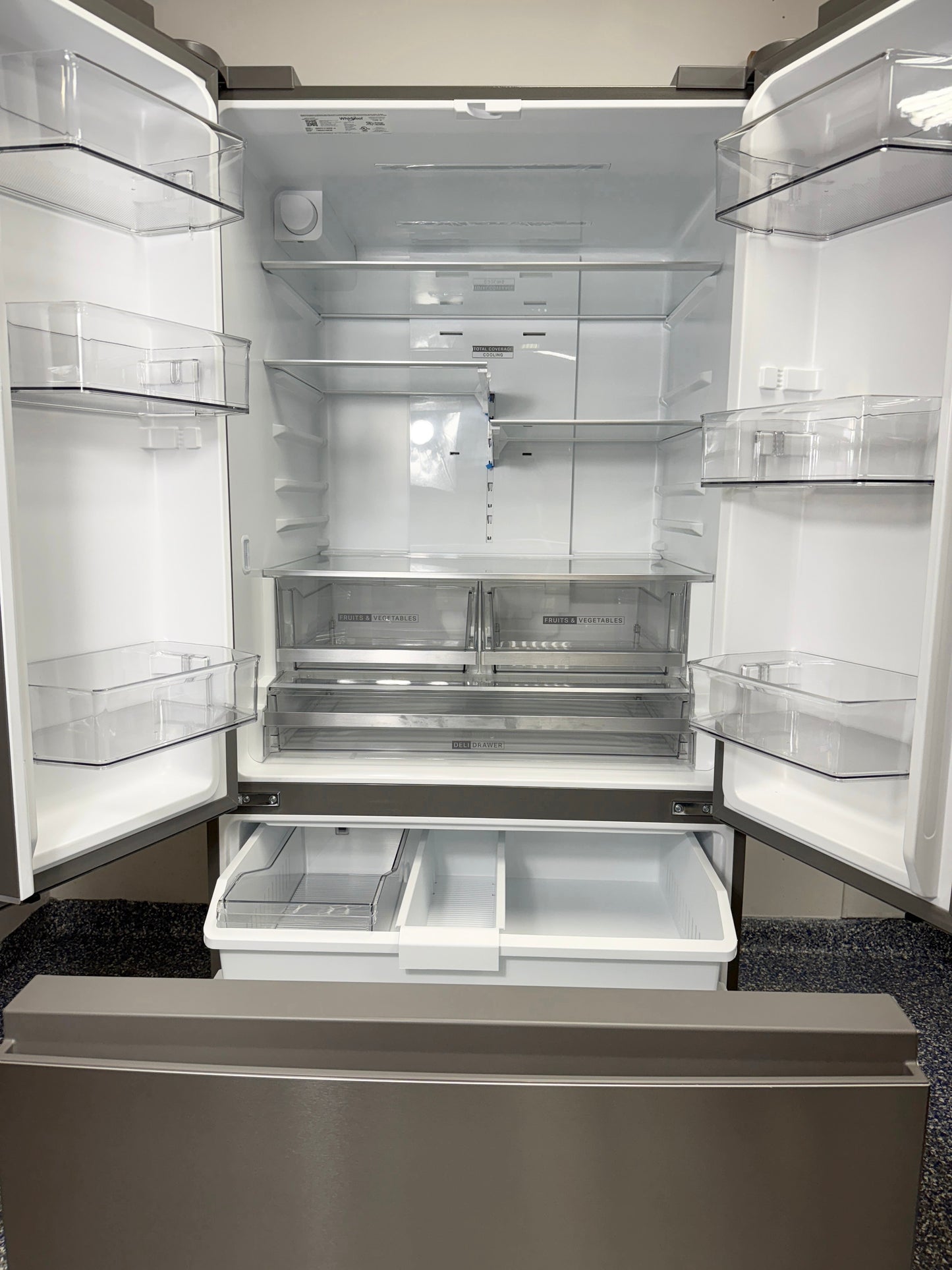 Interior view showing shelving and storage space of WHIRLPOOL WRFF3136SZ in Overland Park.