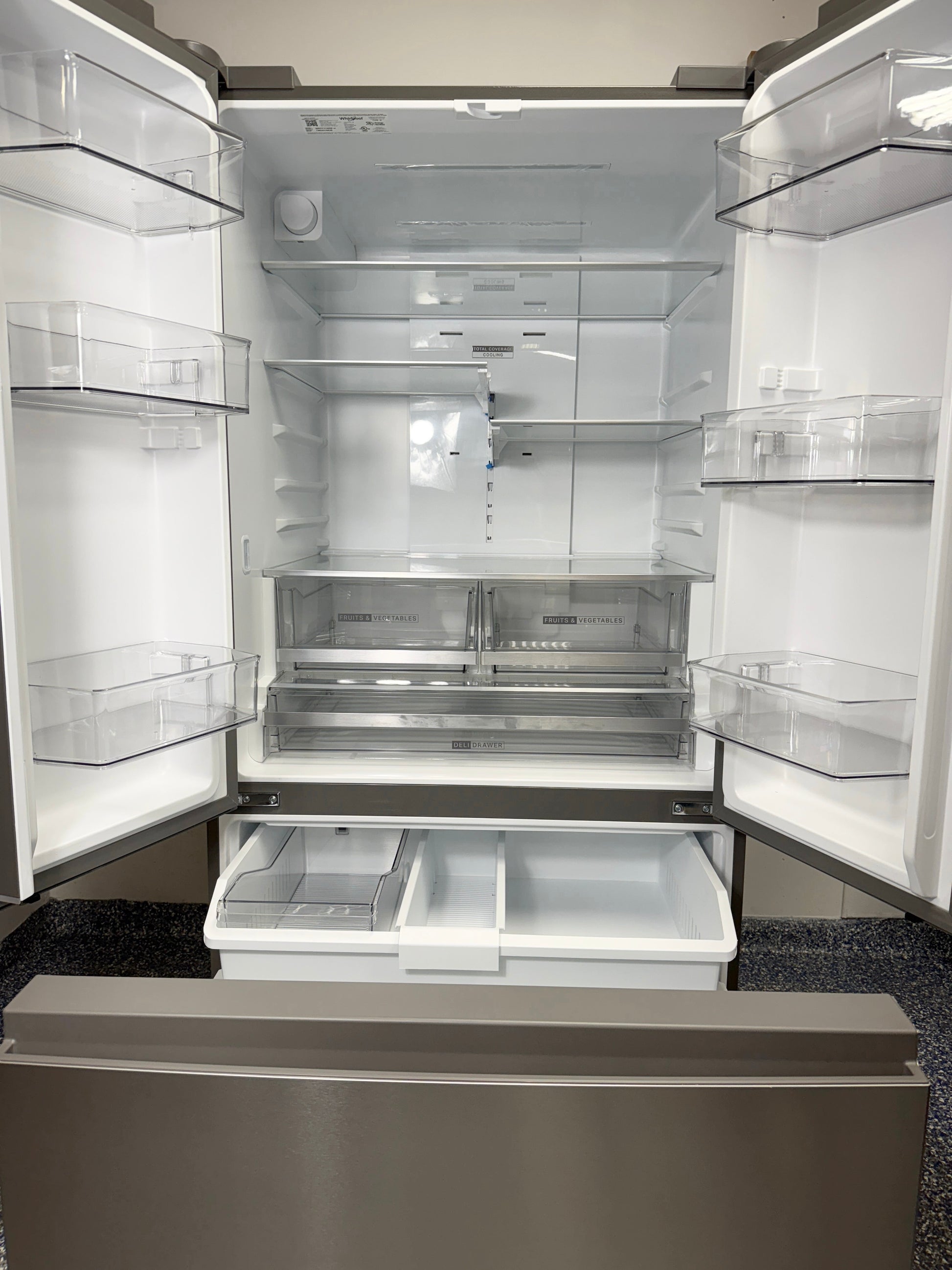 Interior view showing shelving and storage space of WHIRLPOOL WRFF3136SZ in Overland Park.
