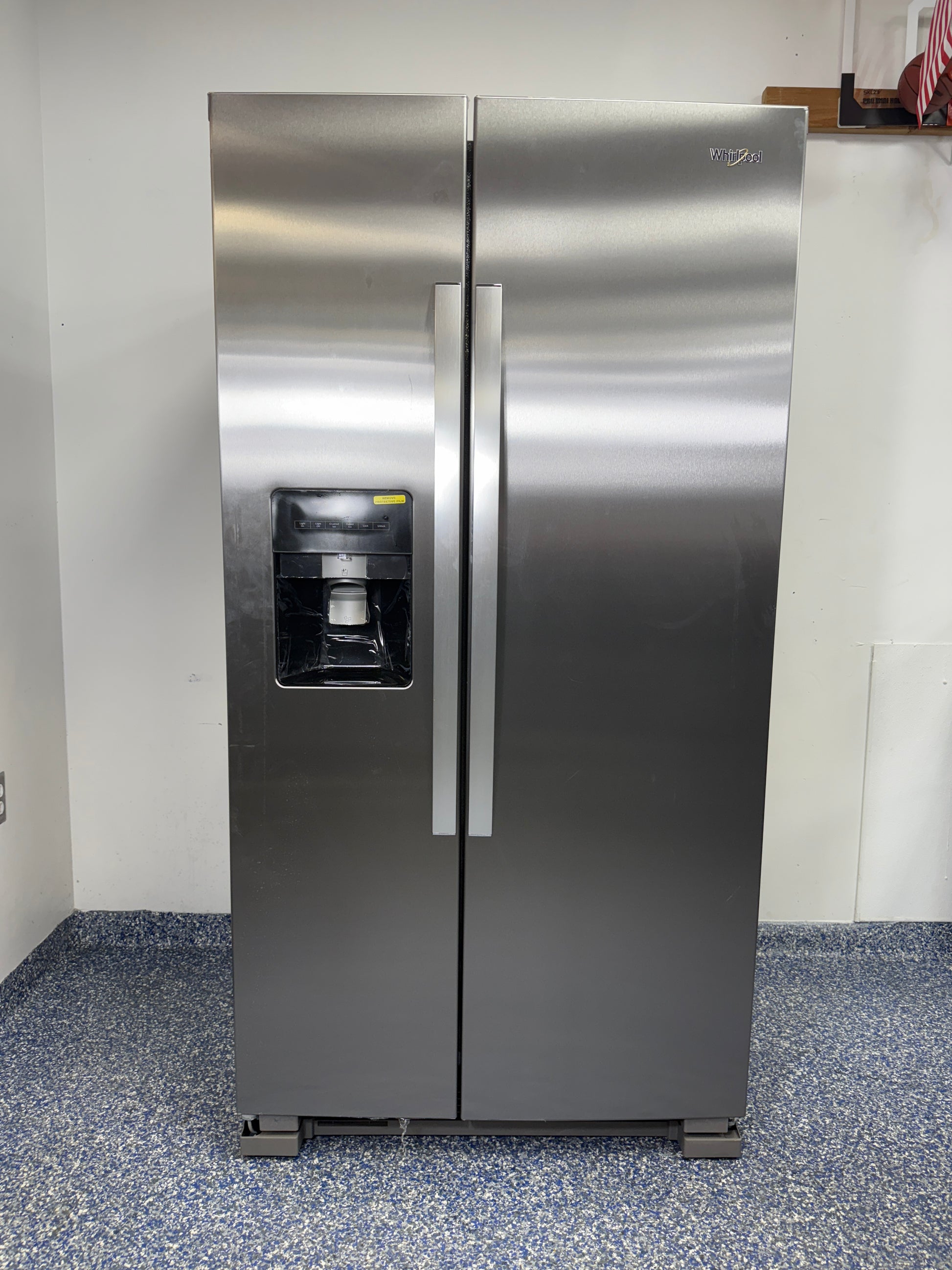 Front view of the Whirlpool WRS315SDHZ 20.5 cu ft Side-by-Side Refrigerator in stainless steel. On sale at Appliance Shark - Scratch & Dent store | Kansas City.