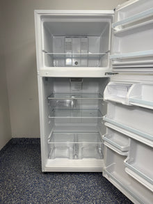 An overhead shot of the WHIRLPOOL WRT318FZDW with both the refrigerator and freezer doors open, showcasing the interior shelves and bins. On sale at Appliance Shark - Scratch & Dent store | Kansas City.