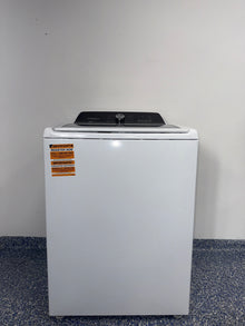 The WHIRLPOOL WTW5057LW top load washer from the front, a durable model for a great deal in Kansas.