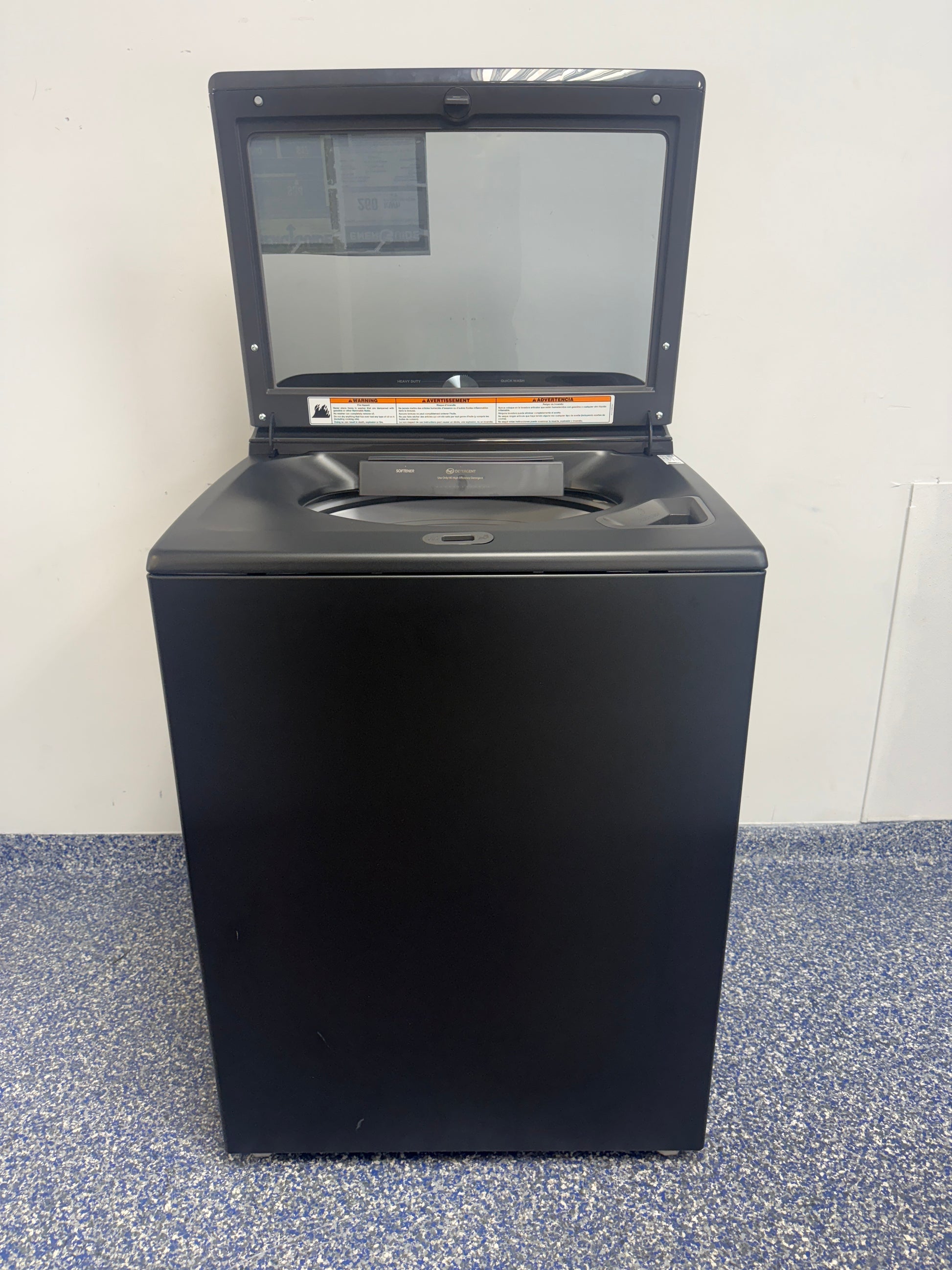 Close-up of the 360° wash agitator action of the WHIRLPOOL WTW6157PB1 top-load washer, for Kansas City households.