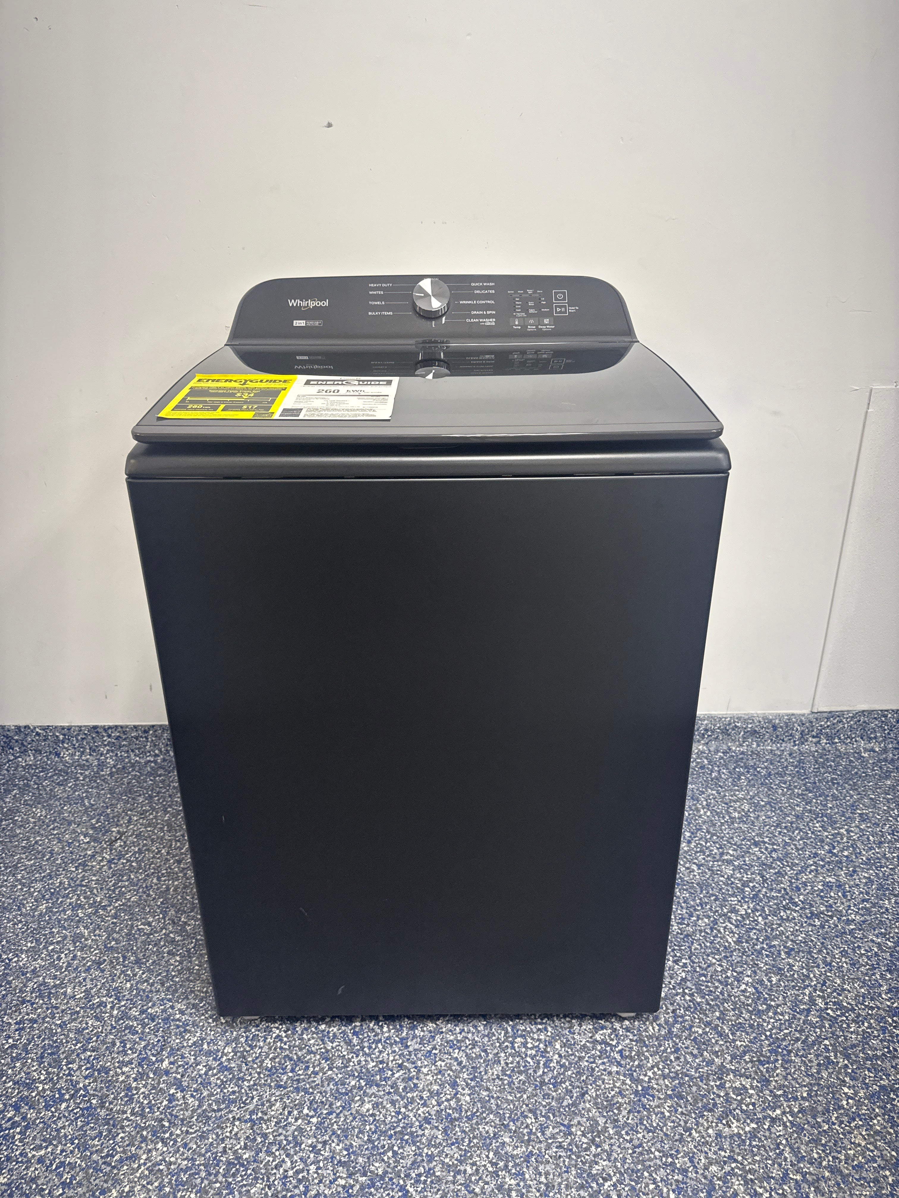 Smart control panel and digital interface of the WHIRLPOOL WTW6157PB1, shown in Overland Park, KS.