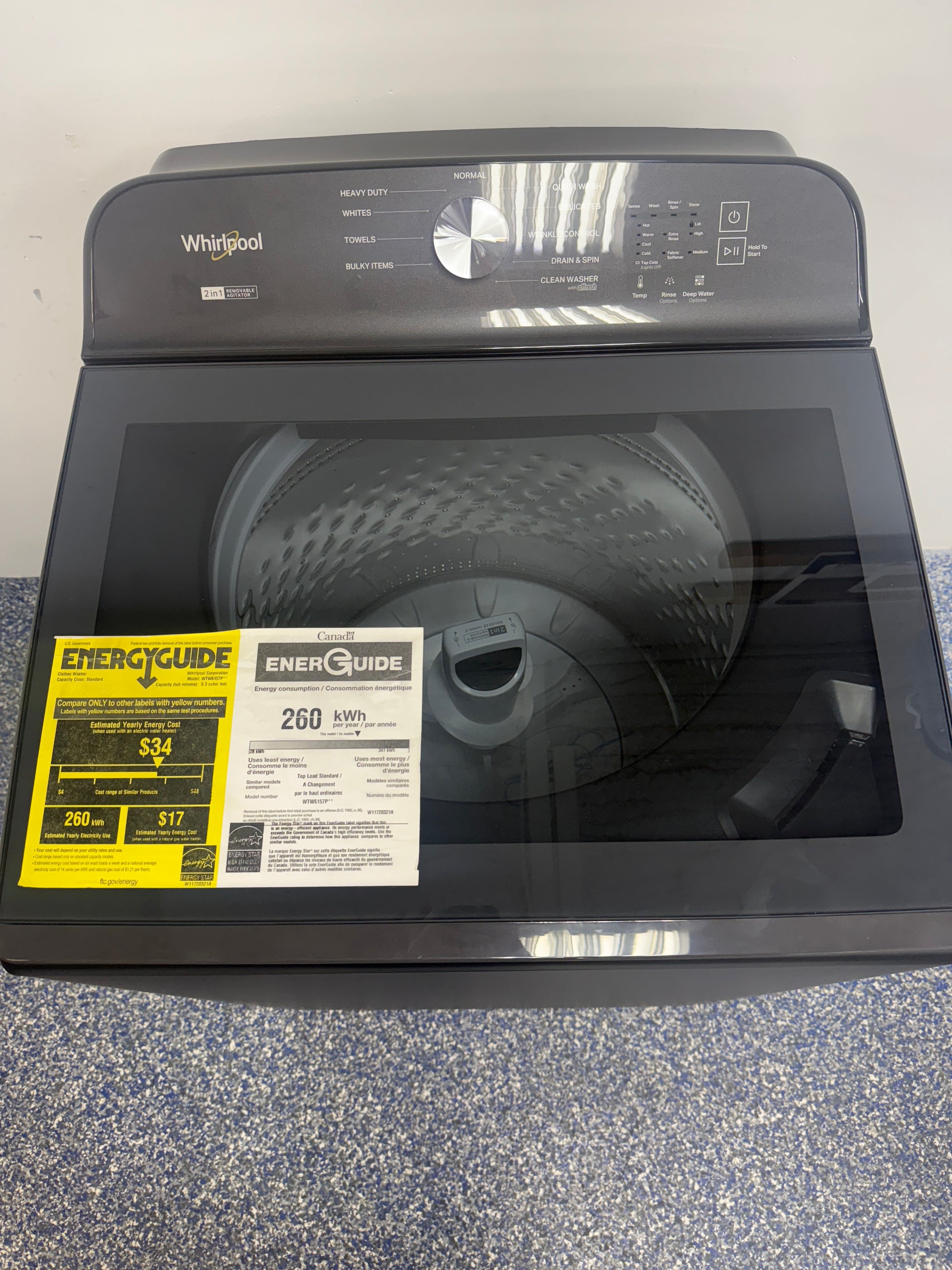 Front view of the WHIRLPOOL WTW6157PB1 5.3 cu ft top-load washer in black, available in Overland Park, KS.