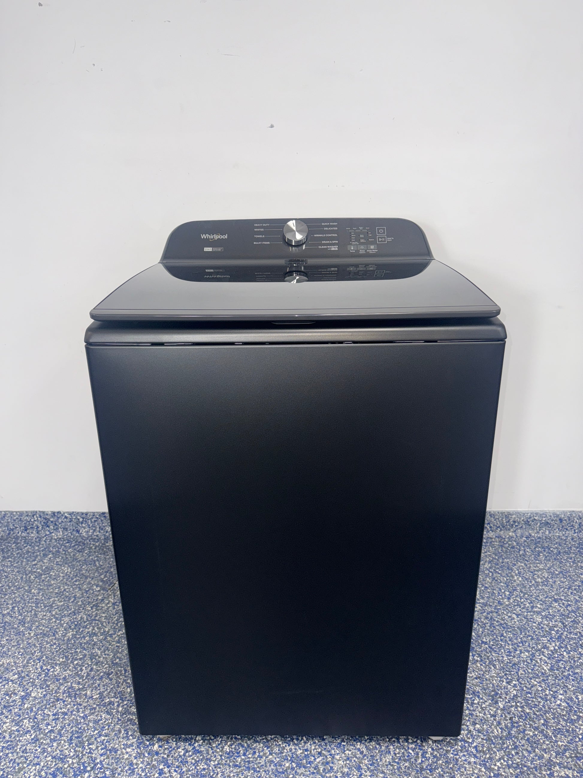 Front view of the WHIRLPOOL WTW6157PB1 top-load washer in Volcano Black, available in Overland Park, KS.