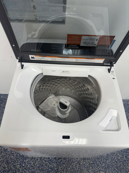 Interior view showing the smooth spiral stainless steel wash basket of the WHIRLPOOL WTW6157PW in a Kansas City home.