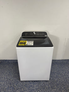 Front view of the WHIRLPOOL WTW6157PW1 top load washer installed in a Kansas City laundry room.