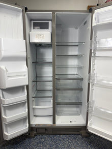 Interior look at the WRS325SDHZ refrigerator, highlighting the spacious In-Door-Ice storage and adjustable gallon door bins.